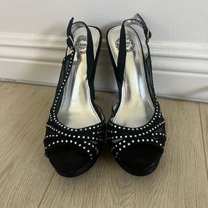 Black rhinestone pumps